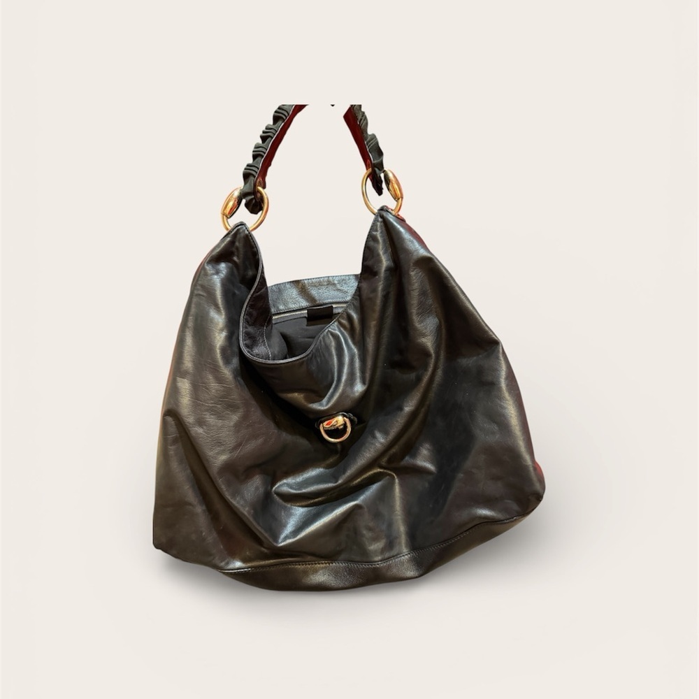 Gucci black leather hobo bag with gold detail
